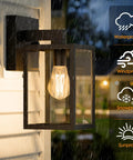 Built Tough Black Outdoor Wall Lantern With Waterproof Exterior Sconce featuring E26 socket, mounted in rain, showing bulb.