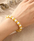 Gold Mini Crown Charms 100 Pieces, 3D Vintage Alloy Queen King Crowns Beads With Large Hole Bracelet on wrist