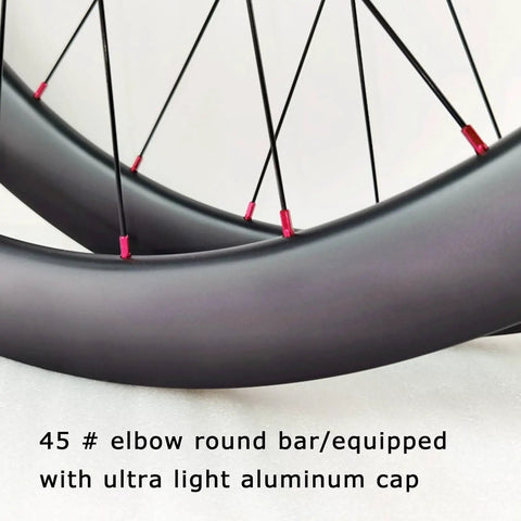 Close-up of Dialed Carbon Fiber 700C Disc Brake Road Wheelset with 50mm rims and spokes, showing aluminum hub details.