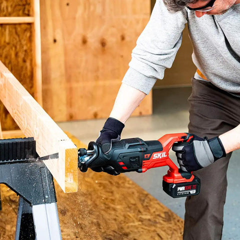 Person using Cordless Reciprocating Saw Kit With Brushless 20V PWR CORE 20 Battery for cutting wood