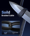 Image of a knife cutting through a braided cable demonstrating durability. Close-up of solid braiding detail.