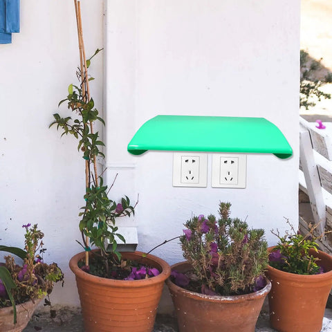 Heavy Duty Green Abs Weather Resistant Ev Charger Station Protection Box With Rock Solid Sun Shield And No Sweat Rain Guard For Outdoor Parking Lot Use mounted above electrical outlets.