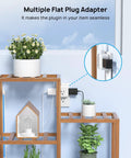 Six In One Wall Outlet Extender With USB C And USB A Ports, 3 Type A Sockets, 1 Type B; plugged in shelf with plants.