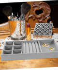 Chic Five Grid Jewelry Organizer Tray For Dresser Drawer With Cozy Flannel Interior And Polished Faux Leather Exterior filled with rings.