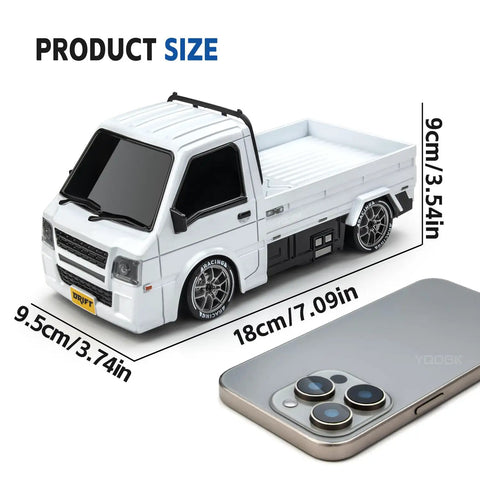 4WD Drift RC Car With 2.4GHz Remote And Dual Battery Setup, 20kmh High Speed, Durable PVC Body beside a smartphone for size comparison