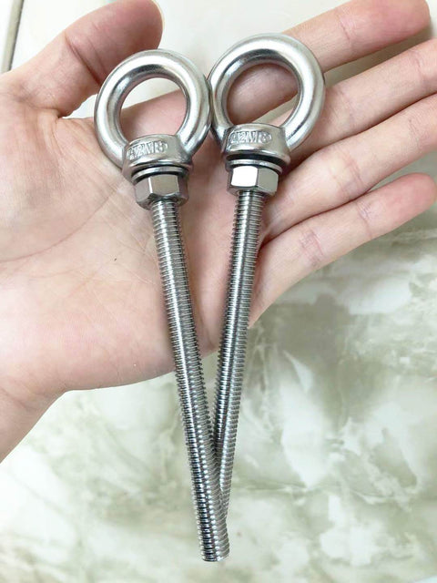 Beefy M8 Stainless Steel Shoulder Eye Bolts, 4 Pack, in hand, showcasing heavy duty bolts with washers and nuts, long shank, 100mm thread length.