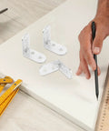 Stainless Steel L Bracket Corner Desk Connector with Easy Install and Compact Design shown on a workspace setup with tools