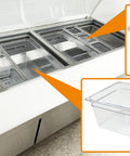 Commercial Buffet Cold Table Refrigerator Delivers Prime Cooling And Slick Stainless Steel Exterior 72 Inch Wide Salad Display Counter Fridge Cooler with clear lids and containers for ingredients.