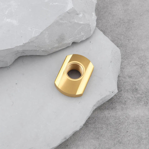Solid M8 Brass Hydrofoil T Nuts For Water Sports Tracks 4 Pack Marine Grade Hardware 20X14mm size on a flat surface.