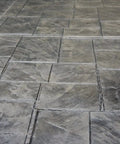 Rock Solid Penetrating Concrete Sealer 5 Gallon Solvent Based Wet Look Finish on stamped concrete surface.