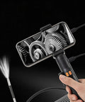 Heavy Duty Borescope Camera With Bendable Endoscope Lens For Tight Squeeze Diagnostics And Real Time Video Feed showing gears on phone display.