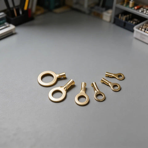 Top Grade 150 Pcs Brass Ring Cable Lug Terminal Kit With M3 To M10 Sizes For Solid Bare Copper Wire Crimping And Easy Home Auto Wiring Projects Inside Neat Clear Storage Box. Brass ring terminals in M3 to M10 sizes on workbench