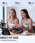 Two women using Wireless Lavalier Microphone System For iPhone Android And Cameras 2 Pack Cordless Lapel Mics, seated at a table.