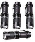 Ultra Bright Mini LED Flashlights 7W Zoomable Handheld Beams, black water-resistant, 4 pack displayed upright on white background.