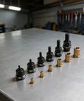 Heavy Duty Carbon Steel Replacement Rivet Nut Mandrels, Six Piece Set For M3 To M10 Manual Hand Riveter Tools arranged on metal surface.