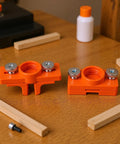 Pro Level Hella Slick Edge Banding Glue Dispenser With Adjustable Pressure For Furniture Cabinet Making On 10 To 30mm Boards features orange body and adjustable knobs.