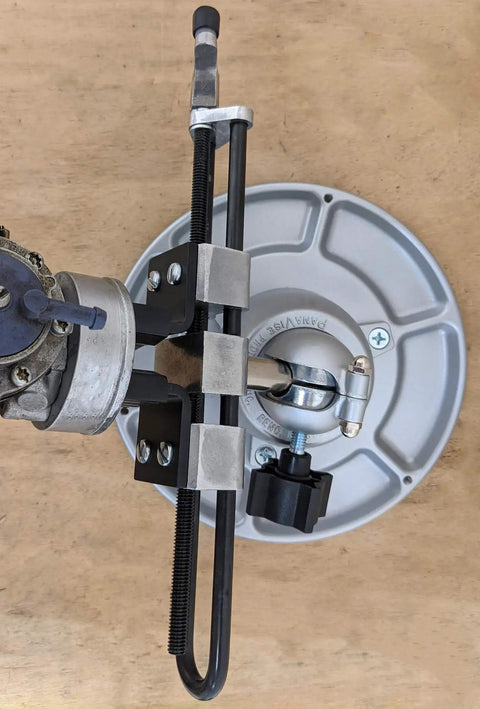 Top view of Multi Purpose Work Center With Self Centering Jaws 9 Inch Opening Built Tough Heavy Duty Base on wooden surface.