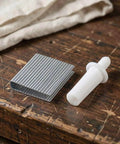 Hassle Free Shutter Repair Pins And Blind Slat Connectors For Plantation Windows And Wood Blinds With Tilt Rod Clips on wooden table.