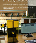 D1 Ultra 30W Fiber and 20W Diode Dual Laser Engraver With 16MP Auto Position Camera on desk with computer monitor.