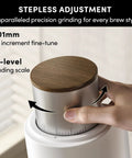Top Tier Single Dose Coffee Grinder Built For Killer Extraction features stepless adjustment with 65-level grinding scale.