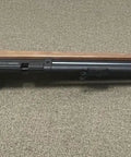 Hard Hitting 25 Cal PCP Air Rifle With 3500 PSI Tank For Serious Power And Precision, side view on carpet.