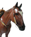 Custom Western Leather Headstall And Breast Collar Tack Set Showcasing Fire Painted Finish on a brown horse head close-up.