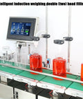 Heavy Duty Automatic Liquid Filling Machine On Rugged Conveyor Belt Built Tough Double Head Bottle Filler with liquid containers in use.