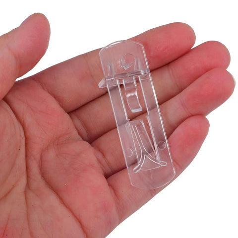 Close-up of a single peg from 10-Pack Plastic Shelf Pegs For Cabinets And Shelves, Durable ABS Material, Easy Adjustment, in hand.