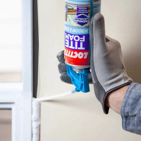 Person applying DIY Friendly Tite Foam Window And Door White Insulating Sealant High Density Expanding Foam For Gaps And Cracks