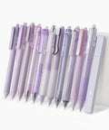 Pastel Purple Gel Pen Set 12 Pack With One Matching Highlighter Black Ink 0.5mm Fine Point Smooth Gel Pens arranged in a row