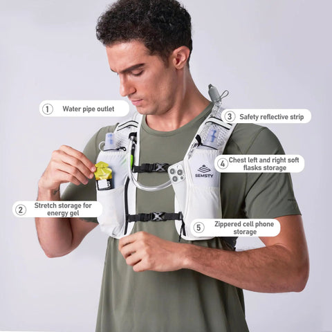 Person wearing Go-To 5L Hydration Vest for Running and Cycling with Dual 500ml Soft Flasks, showing pockets and adjustable straps.