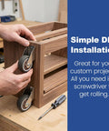 Hands installing Two Inch Low Profile Door Support Wheels, Anti Sag Caster Rollers For Solid Wood Doors And Gates on a wooden frame.