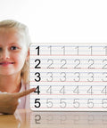 Child holding 32 Pack Double Sided Mini Whiteboards 9x12 Inch With Lined Surfaces For Kids Students Teachers And Classrooms The Handy Dry Erase Boards For Math And English Practice Reusable And Great For On The Go Learning, lined side visible.