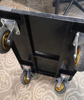 Heavy Duty Folding Hand Truck With All Way Swivel Wheels And Reinforced Steel Base for easy maneuvering with multi-directional wheels.