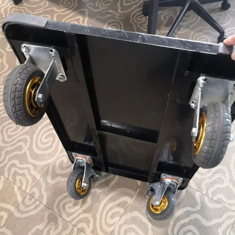 Heavy Duty Folding Hand Truck With All Way Swivel Wheels And Reinforced Steel Base for easy maneuvering with multi-directional wheels.