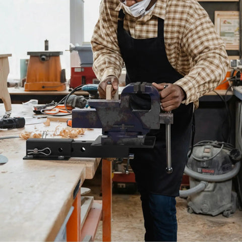 Worker using the Beefy 2-Inch Receiver Hitch Vise Mount For Bench Work, Heavy Duty Grinder Stand And Trailer Hitch Vise Plate