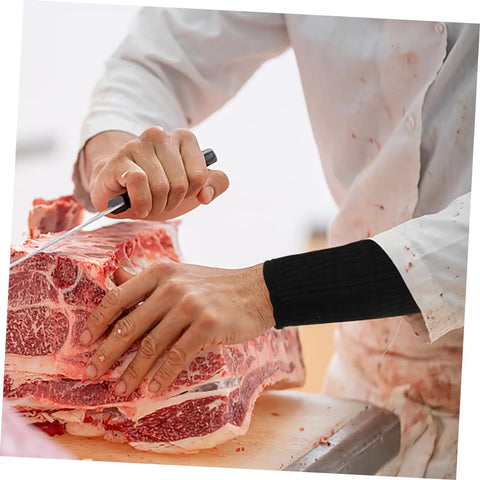 2 Pack Cut Resistant Arm Sleeves Hella Tough Pe Guard Top Shelf Protection For Gardening Welding Metalwork And Crafting Keep Your Forearms Beat Proof With Ergonomic Fit And Lightweight Portability For Pros And DIYers worn while slicing meat on a cutting board.