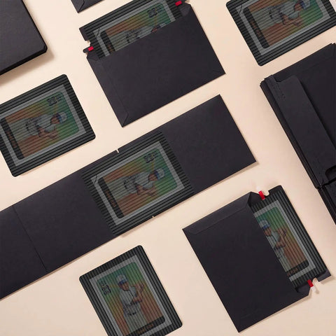 Trading Card Shipping Kit 400 Pcs Envelopes And Rigid Self Seal Mailers 4x6 for TCG and sports cards on a flat surface