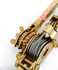 Close-up of Beefy 2 Ton Come Along Winch Hand Cable Puller With 2 Hooks And 2 Gears, featuring durable steel construction.