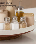 Super Smooth Spinning Ceramic Lazy Susan Tray With Natural Acacia Wood Base Round Rotating Kitchen Counter Organizer And Farmhouse Condiment Holder Totally Game Changer with spices and condiments displayed.