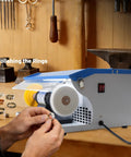 Pro Grade Heavy Duty 500W Jewelry Bench Polisher With Integrated Dust Collector And Adjustable Speed Control For Serious Jewelers Kickin Torque Motor Double Head Grinding Buffing Station in use polishing rings.