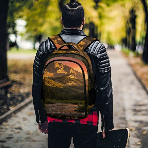 Golden Hour Creek Printed Unisex Backpack With Large Capacity Dope Everyday Carry for school travel hiking and commute shown outdoors