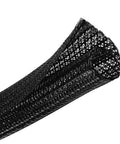 Close-up of black 10 Ft 1 In Split Cable Loom Hider for USB and power cords, cable sleeve protector for computer wires and audio video cables.