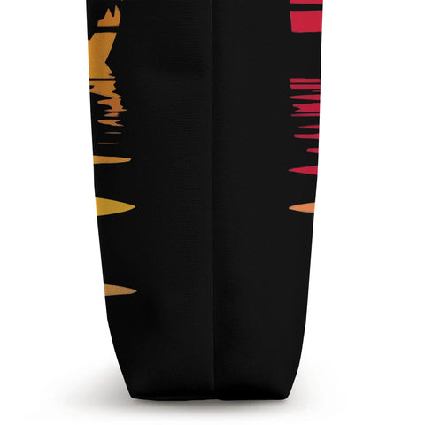 Side view of Dragon Boat Paddler Tote Bag For Dragonboating Enthusiasts And Teams, showing durable black fabric with colorful design.