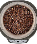 Heavy Duty Electric Coffee Roaster With Adjustable Temperature For Fresh Bean Roasting Nuts Peanuts And Popcorn Gray showing roasted coffee beans in a round drum.