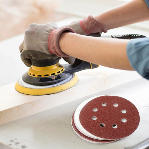 Using random orbital sander with 110 Pack 5 Inch 8 Hole Sanding Discs Set With Hook And Loop Aluminum Oxide Pads on wood