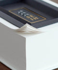 Gothic Fantasy Book Safe With Real Pages And Combo Lock Box, Crimson Dragon Crest Decor, showing stacked pages and hidden compartment.