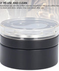 Clear lid on black espresso distributor, 58mm bearing rotation tool for even coffee powder distribution. Top Shelf 58mm Bearing Rotation Coffee Distributor And Stainless Steel Tai Chi Needle Tool For Hella Even Espresso Powder Distribution With Smooth Operation For Home Barista Sessions.
