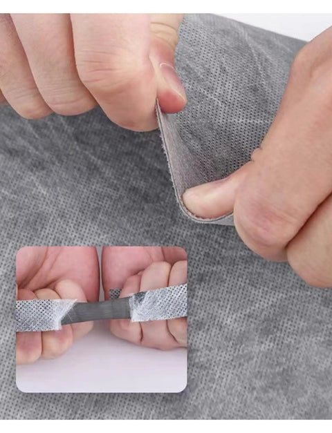 Hands demonstrating the Heavy Duty Polyethylene Decoupling Membrane For Walls And Floors, showing flexibility and layered texture.