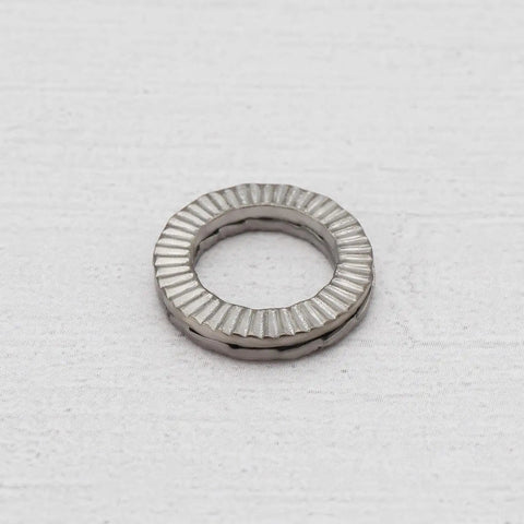 Heavy Duty M8 Wedge Locking Washer Set Of Twenty double stack manganese steel hardware for bolts and nuts, showing detailed texture.